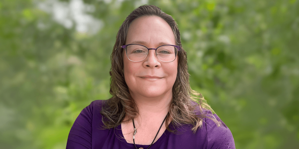 Kellie Winzinowich, a Certified Hypnotherapist and Aligned Embodiment Coach, guiding individuals through transformative healing and personal growth.