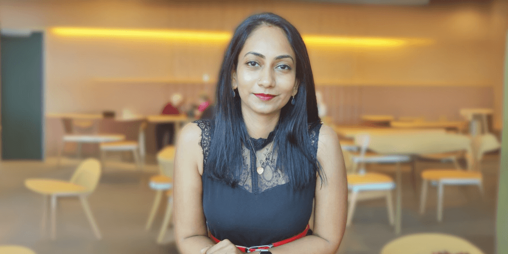 Poornima L Nathan, founder of Everse Pty. Ltd., poses confidently in a professional setting. Her company specializes in integrating AI and automation into legacy systems, helping businesses innovate without disrupting their operations. Everse focuses on delivering tailored, sustainable solutions for enterprises, ensuring the ethical and practical adoption of advanced technologies.