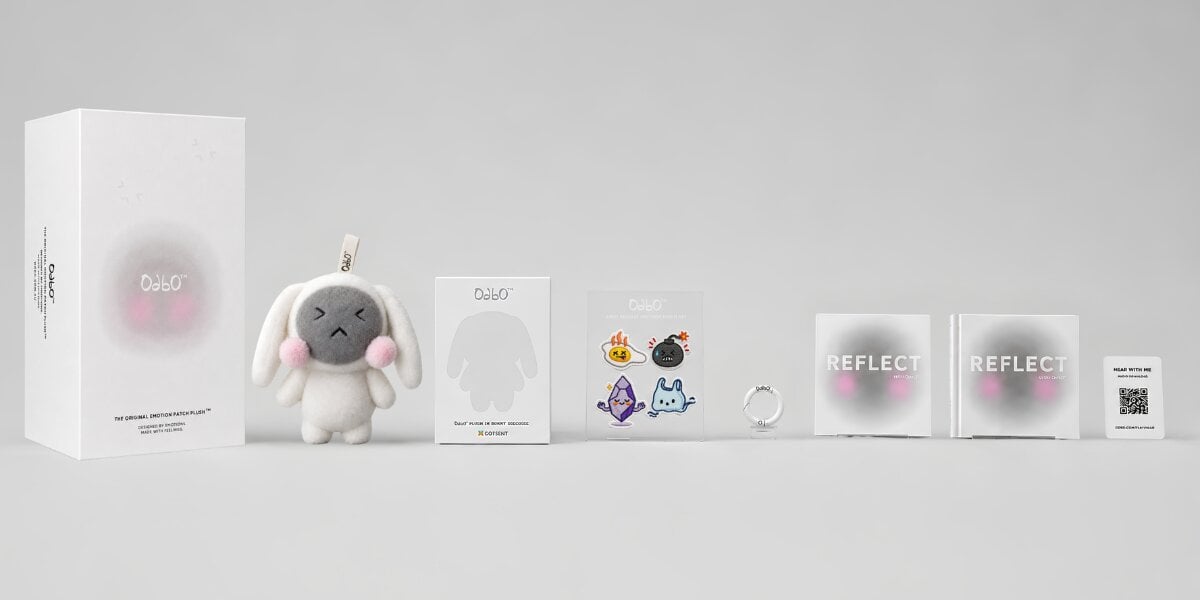OdbO First Release collection with plush, emotion patches, journal, audio card, and packaging.