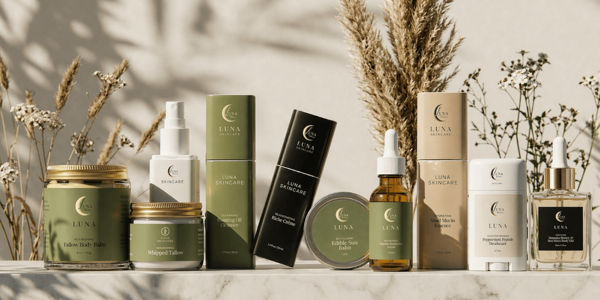 An array of Luna Skincare products displayed elegantly with dried flowers in the background