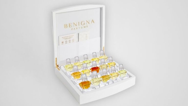Perfume box from Benigna Parfums' Adventure Collection, featuring elegant design and branding.