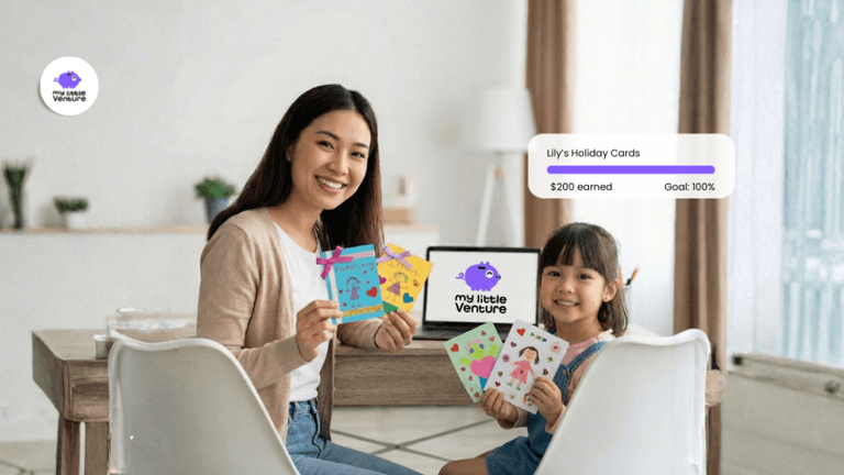 Mother and daughter proudly display handmade cards while tracking progress toward a family goal.