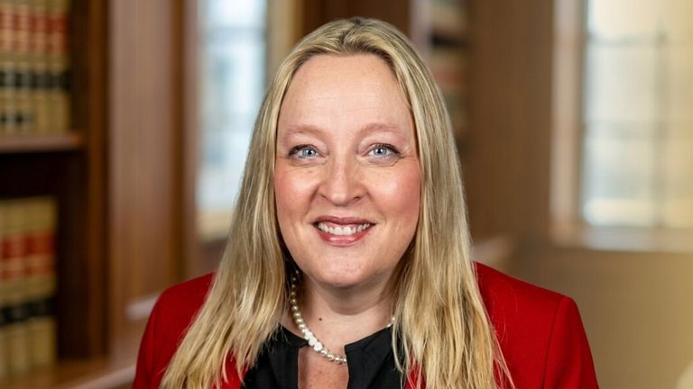 Portrait of Alicia Pozsony, speaker, coach, and resilience educator.