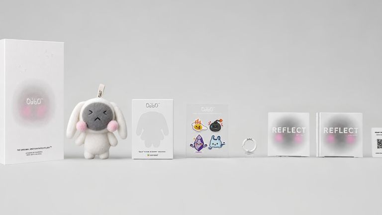 OdbO First Release collection with plush, emotion patches, journal, audio card, and packaging.