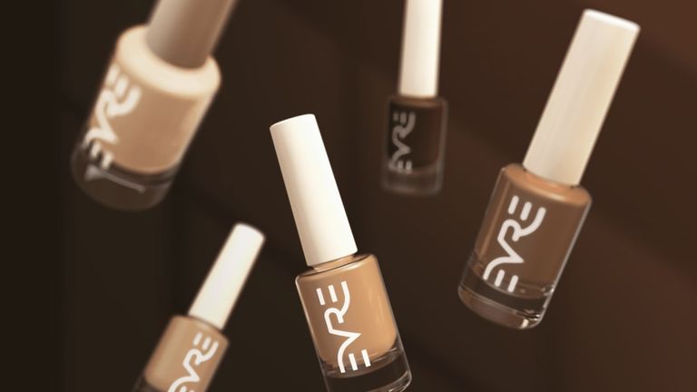 A collection of neutral-toned, non-toxic nail polishes from Everyone's Republic, showcasing shades designed for diverse skin tones.