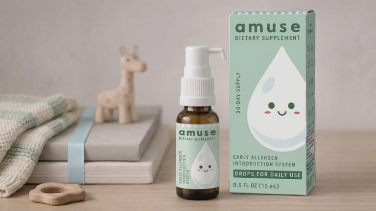 Amuse Drops bottle and packaging displayed beside baby items on a nursery shelf.