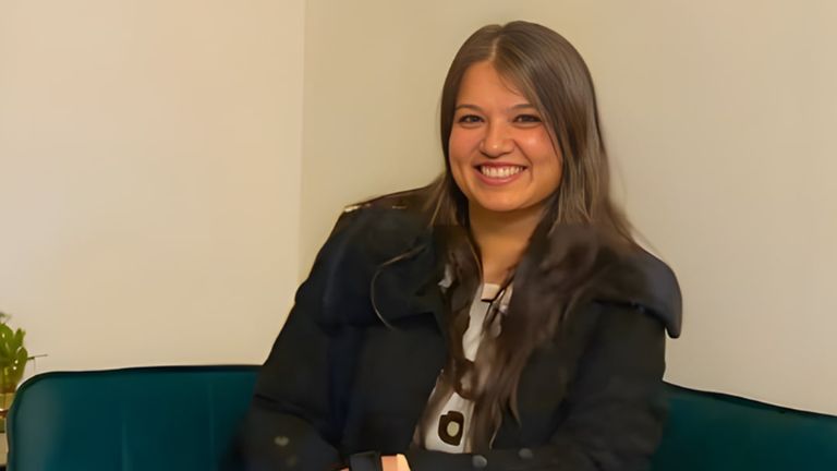Deepanshi Gupta, Co-Founder of Dee&Cee Labs, smiling while seated, representing her AI-driven business automation solutions."