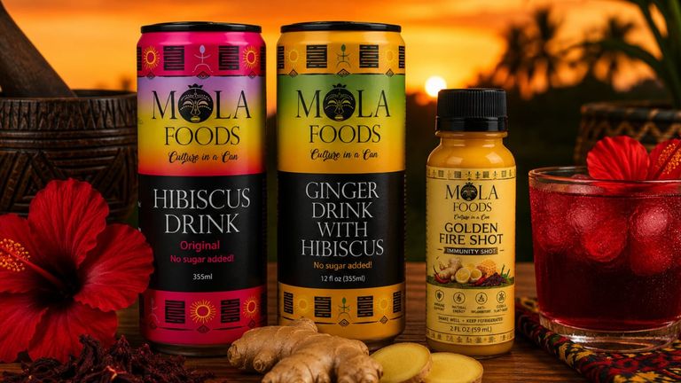 Mola Foods hibiscus drinks and Golden Fire Shot displayed with hibiscus flowers, ginger, and a prepared beverage.