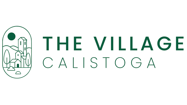 Logo for The Village Calistoga featuring a minimalist village scene with buildings, trees, and the brand name in green.