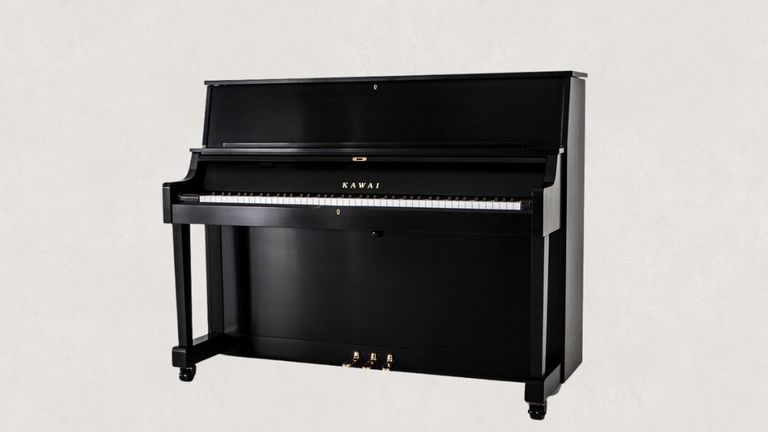 Black upright Kawai piano, highlighting the importance of room acoustics in enhancing sound quality, as discussed by Worldwide Piano.