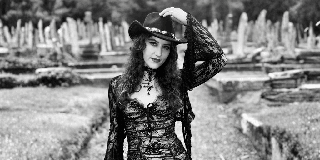 "Alice Ashe, rising Manx music star, blends rock, folk, and pop to create powerful storytelling through her debut single."