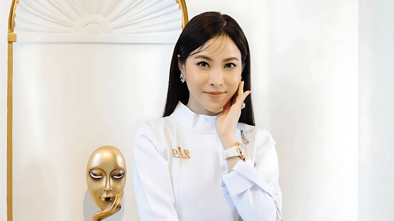 Dr. Laurel, founder and CEO of PAN Aesthetics Specialist Clinic, poses confidently in a white professional outfit, reflecting her leadership in Myanmar's aesthetic medicine. Her clinic is renowned for its commitment to ethical, high-quality treatments using internationally recognized products. Dr. Laurel's dedication to patient safety and education has positioned PAN Aesthetics as a trusted destination for advanced aesthetic services