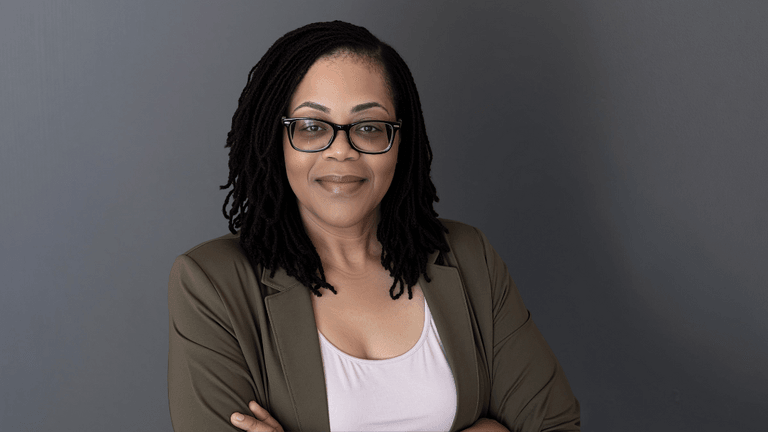Latraila Tolbert, founder of Essential HER Solutions, showcasing leadership in revenue optimization and work-life balance for women entrepreneurs.