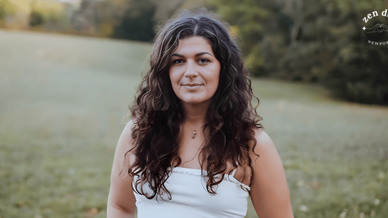 Julia Collins, founder of Zen Den Newport, embodying holistic wellness, offering transformative healing and professional education in energy medicine