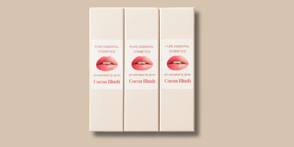 "Pure Essential Cosmetics Cocoa Blush pH-reactive lip gloss, offering personalized color transformation and luxurious hydration with a chocolate scent."