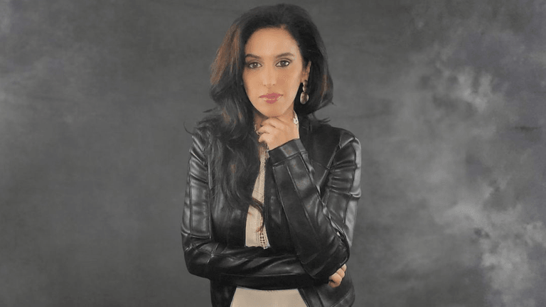 Anissa Sutton, founder of Pump It Up Magazine, embodying empowerment and authentic branding for creatives and entrepreneurs.