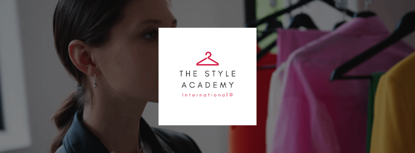 Woman observing colorful clothes on rack with The Style Academy International® logo overlayed, representing online styling education.