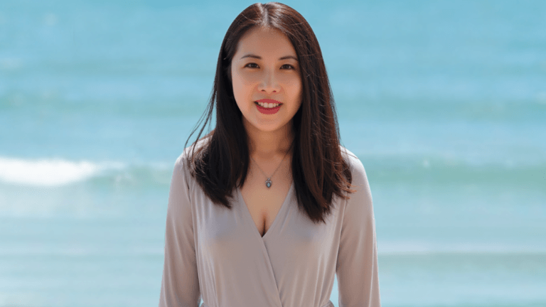 Portrait of Sabrina Huang, mindset coach and emotional healer, empowering women to overcome burnout and achieve balanced success.