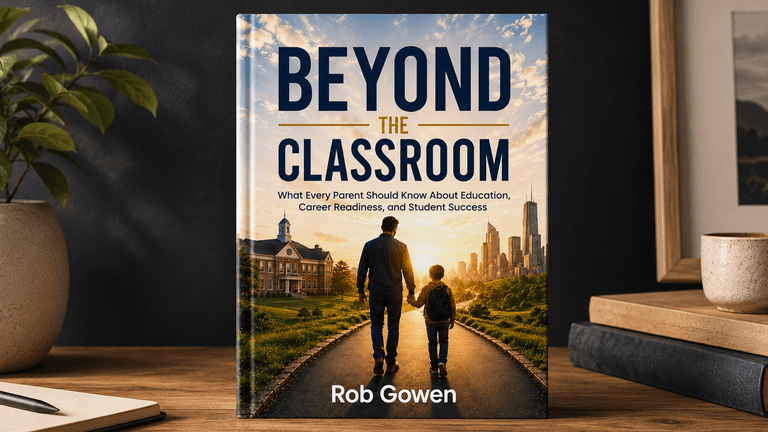 Book titled "Beyond the Classroom" by Rob Gowen on a desk with a plant.