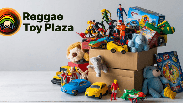 Colorful toys stacked on boxes with the Reggae Toy Plaza logo on the side