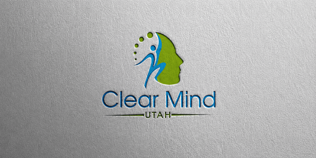Logo for Clear Mind Utah featuring a profile silhouette and abstract figures in green and blue