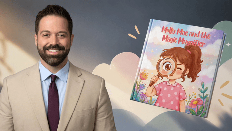 A smiling man in a suit beside the children's book "Molly Mae and the Magic Magnifier"