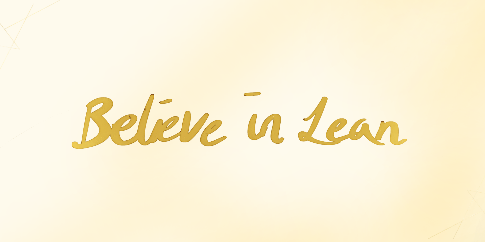 Golden script text saying "Believe in Lean" on a light yellow background