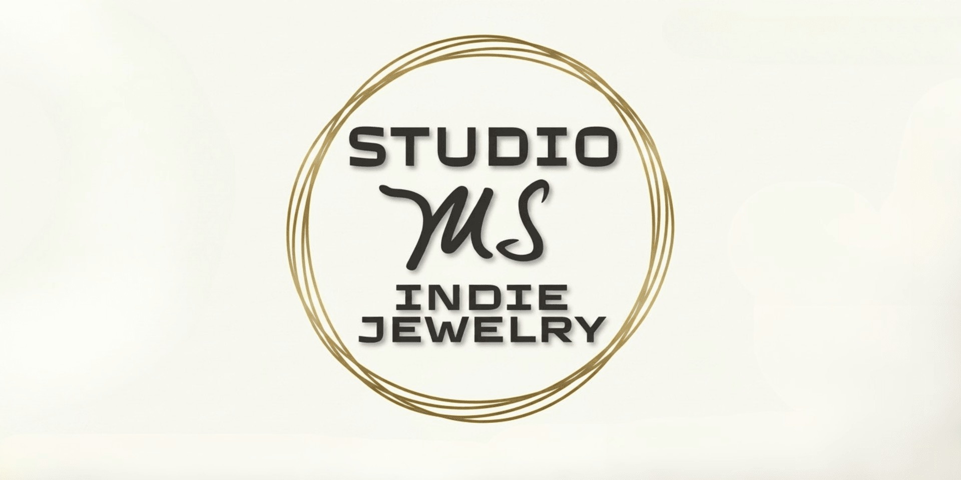 Logo for Studio MS Indie Jewelry, featuring elegant typography and a circular design