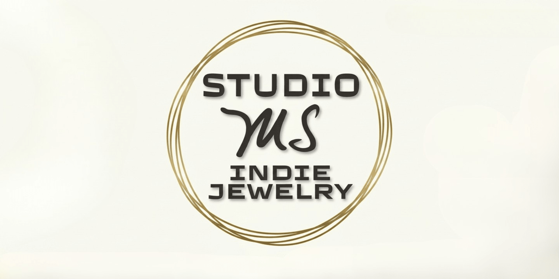 Logo for Studio MS Indie Jewelry, featuring elegant typography and a circular design
