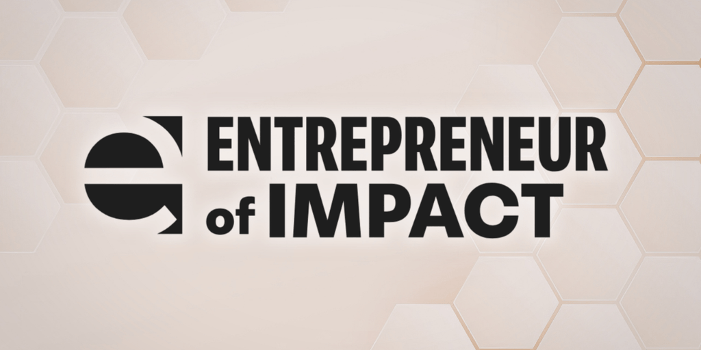 Logo displaying "Entrepreneur of Impact" with hexagonal background design