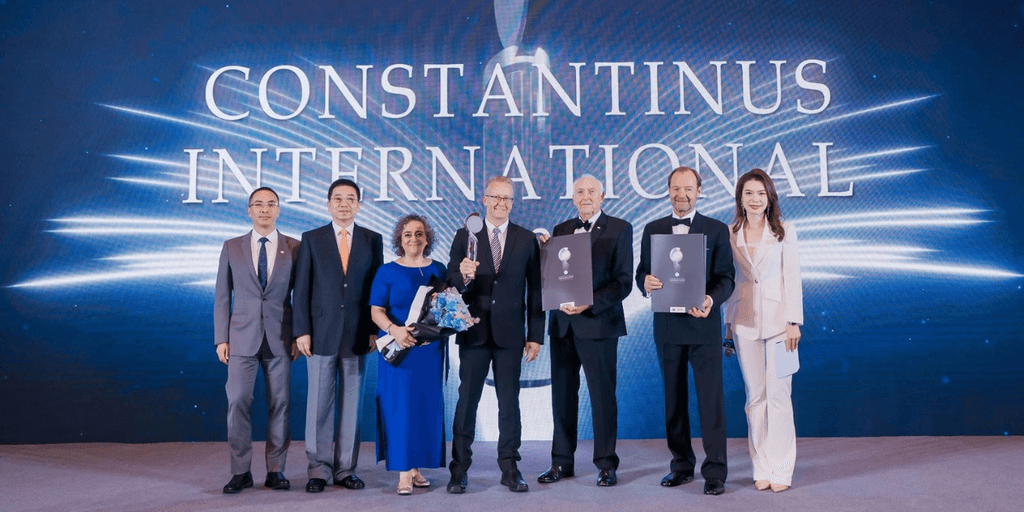 Award recipients pose on stage at the Constantinus International ceremony.