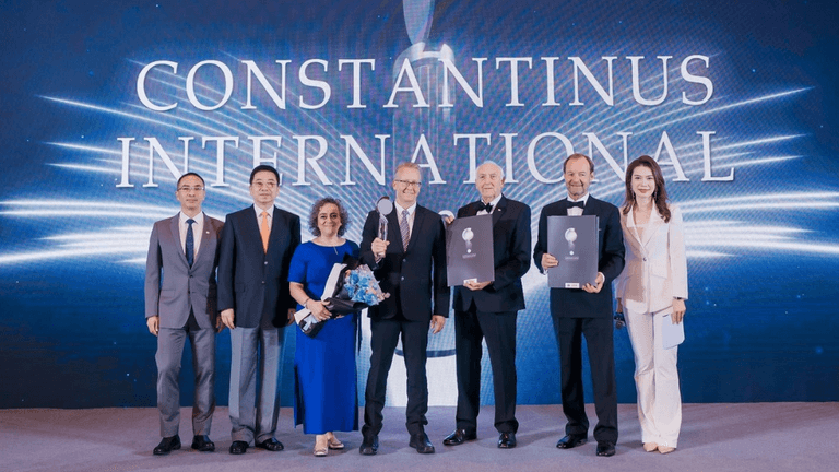 Award recipients pose on stage at the Constantinus International ceremony.