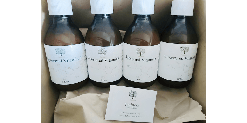 The image shows Junipers' Liposomal Vitamin C bottles, highlighting their clean, effective formulations designed for superior absorption and wellness.