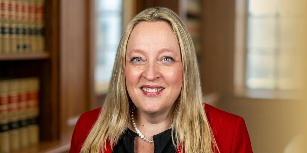 Portrait of Alicia Pozsony, speaker, coach, and resilience educator.
