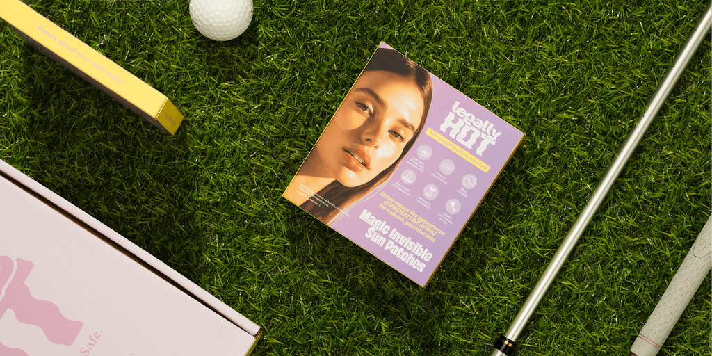 Legally Hot sun protection patch on grass, surrounded by golf equipment, offering 12-hour waterproof, sweatproof UPF50+ protection.