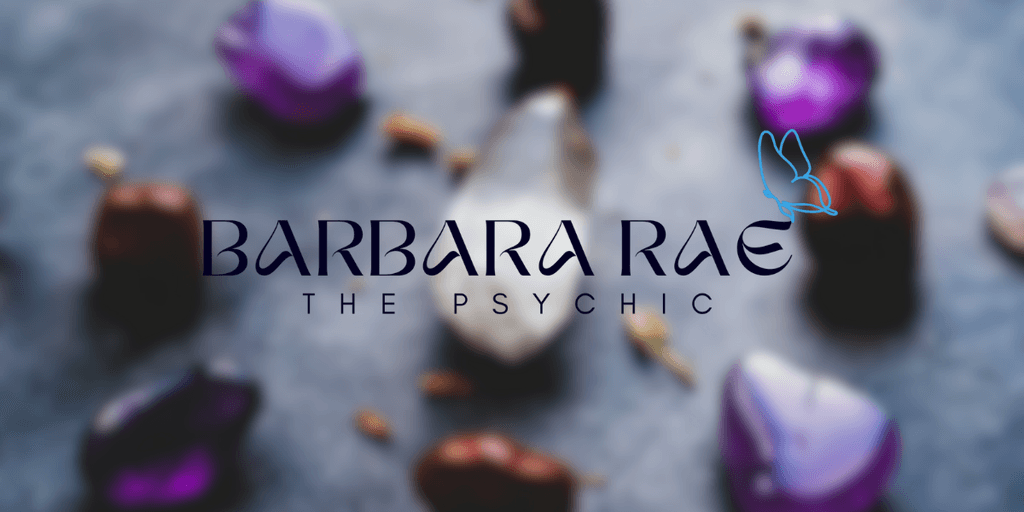 Logo for Barbara Rae The Psychic surrounded by colorful healing crystals, representing intuitive spiritual guidance and tarot wisdom.