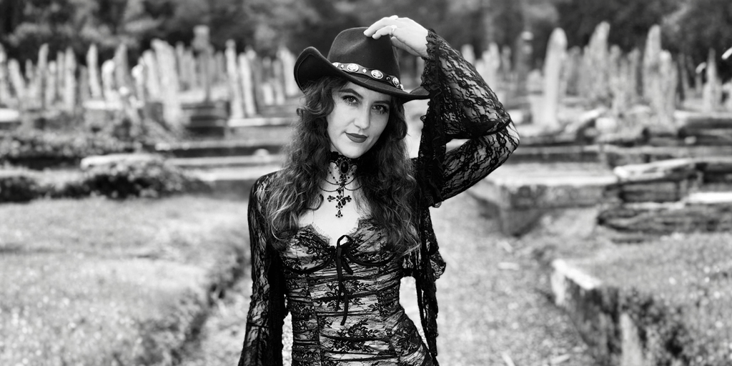 "Alice Ashe, rising Manx music star, blends rock, folk, and pop to create powerful storytelling through her debut single."