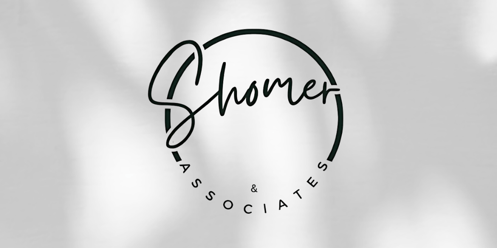 Circular logo reading “Shomer & Associates” with modern script and sans-serif fonts on light background.