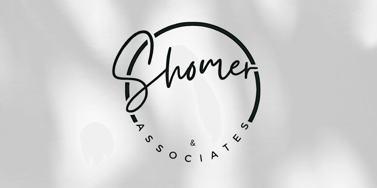 Circular logo reading “Shomer & Associates” with modern script and sans-serif fonts on light background.
