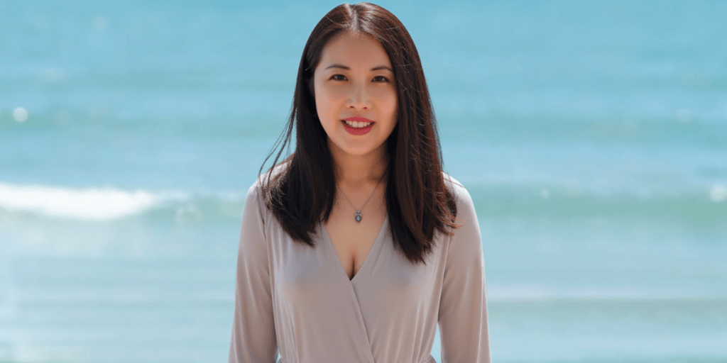 Portrait of Sabrina Huang, mindset coach and emotional healer, empowering women to overcome burnout and achieve balanced success.