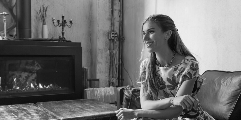 Designer, Heather Jude poses for photos after a successful debut. Captured by Carissa Kearney