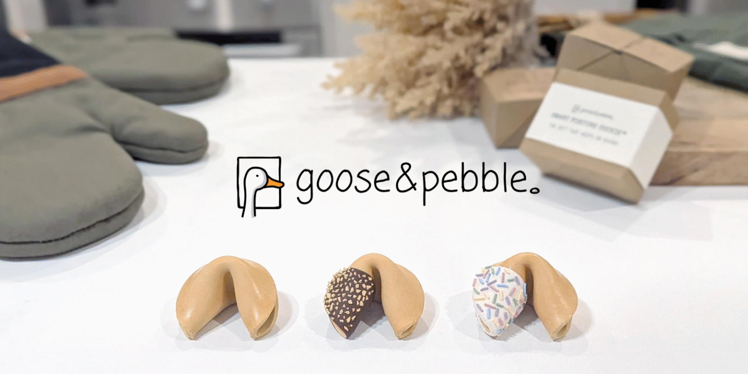 Three Smart Fortune Cookies with unique toppings, displayed with Goose & Pebble branding and gift packaging