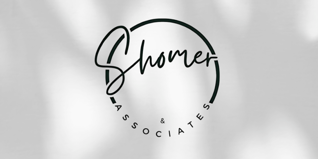 Circular logo reading “Shomer & Associates” with modern script and sans-serif fonts on light background.