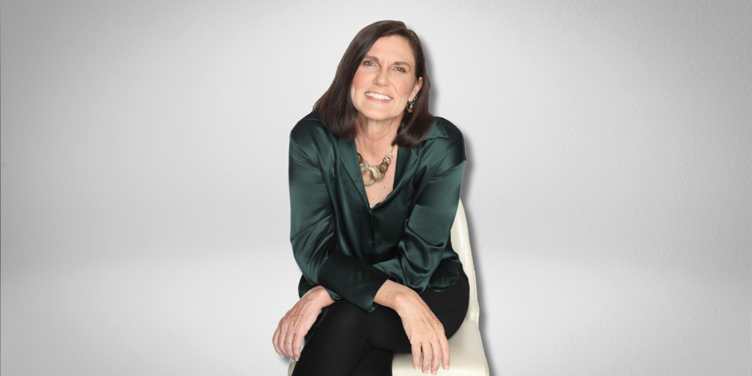 Kim Groshek, founder and CEO of Lifeful Habits & Legacy Leaders Mastermind, smiling confidently while seated. Kim’s approach combines spiritual alignment with strategic clarity to help high-achieving professionals and entrepreneurs create lasting impact and build meaningful legacies.