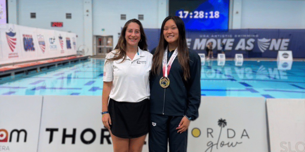 Irma Davarashvili with gold medalist Isabella Wang, celebrating a remarkable victory at the 2025 Junior Olympics.