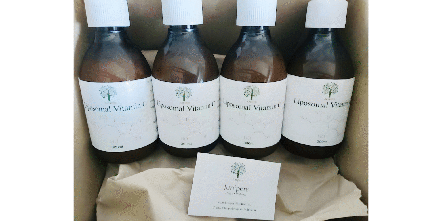 The image shows Junipers' Liposomal Vitamin C bottles, highlighting their clean, effective formulations designed for superior absorption and wellness.