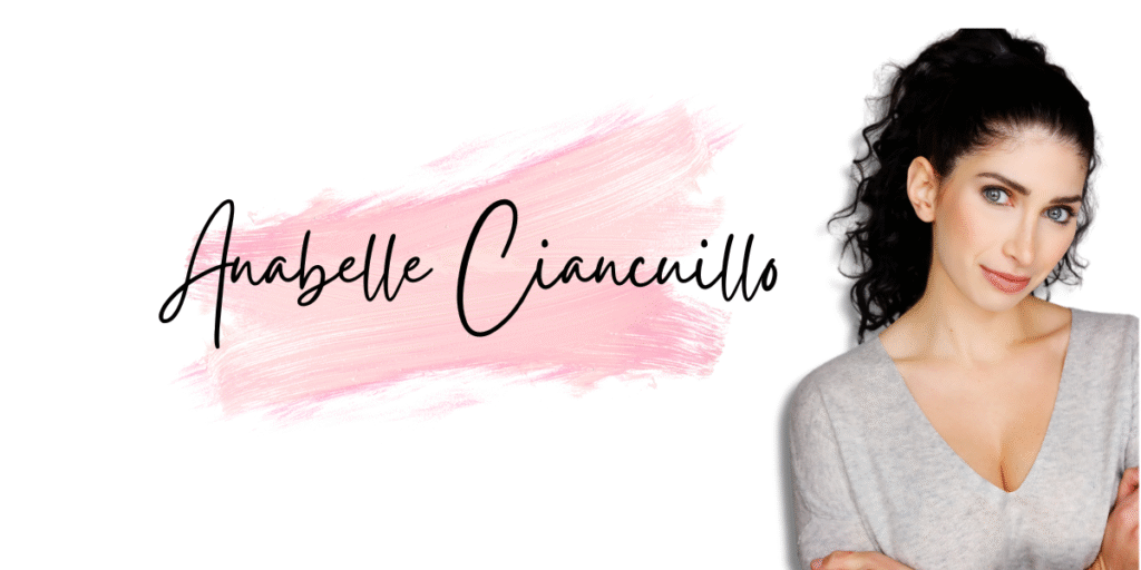 Anabelle Ciancuillo poses against a pink brushstroke background, showcasing her creative energy and passion for storytelling in Hollywood.