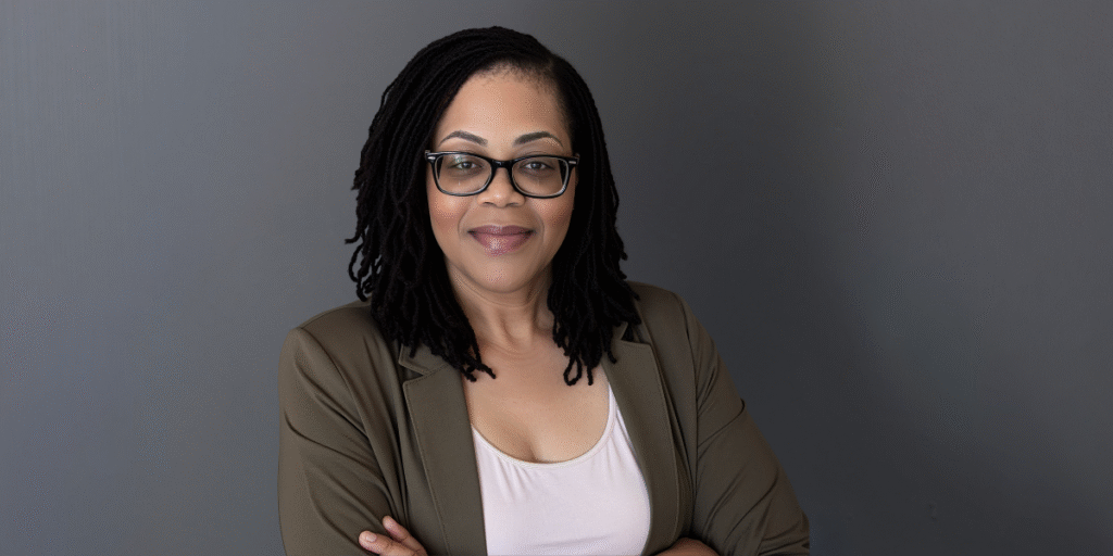 Latraila Tolbert, founder of Essential HER Solutions, showcasing leadership in revenue optimization and work-life balance for women entrepreneurs.