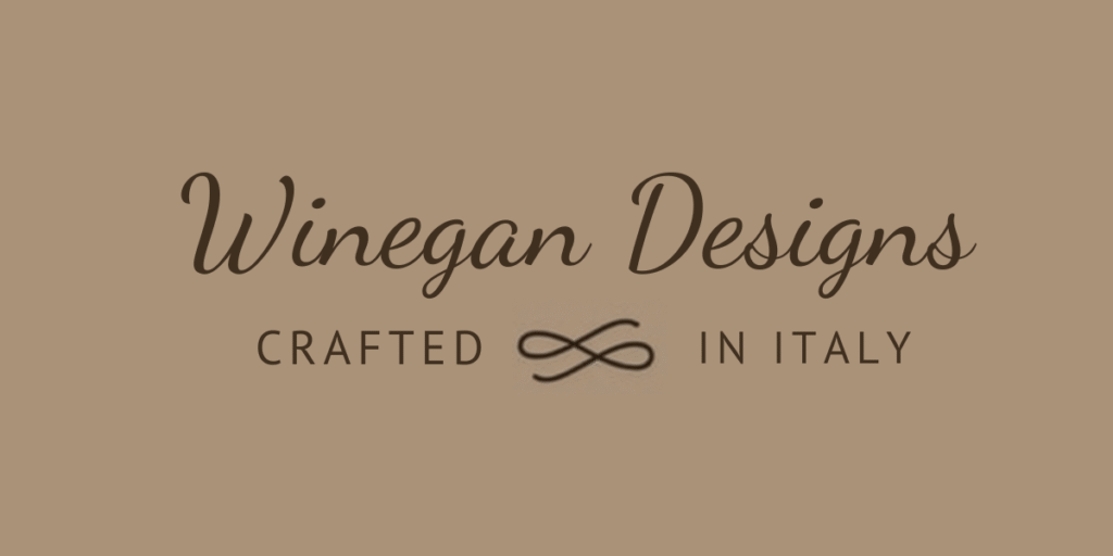 Winegan Designs logo with elegant script, featuring 'Crafted in Italy' and a symbol of timeless craftsmanship and luxury.