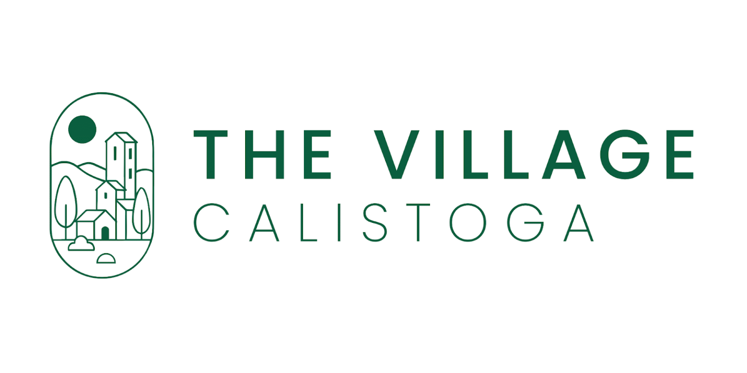 Logo for The Village Calistoga featuring a minimalist village scene with buildings, trees, and the brand name in green.